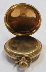 A gold plated pocket watch, the enamelled dial with Roman numerals, the case stamped Star... - 2