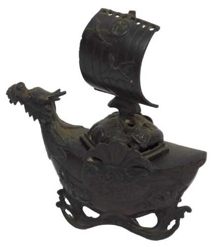 An early 20thC Chinese bronze dragon boat censer, the pierced hexagonal cover with mast and sail,...