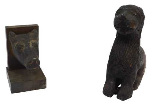 A heavy cast bronze seated Temple Lion, and an oxen head single bookend, 19.5cm high and 13cm...