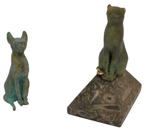 An Egyptian hollow bronze figure of a Bastet Cat, 14cm high, and another Egyptian pottery figure...
