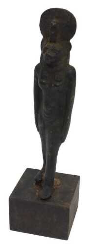 An archaic Egyptian bronze figure of Sekhmet, in a typical striding standing pose, mounted on a...