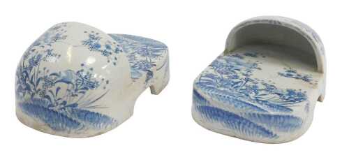 A pair of Japanese Seto porcelain shoes, decorated in underglaze blue with poppies, Meiji period,...
