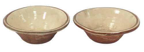 A pair of Victorian glazed terracotta pancheons, 32cm diameter.