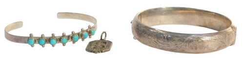 A group of silver and other jewellery, comprising a silver half-hinged bangle, a silver and...