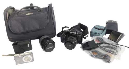 A Minolta Dynax 5000I camera, together with a Minolta 55mm lens, a Programme 3200I flash, other...
