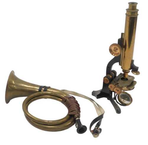 A John Browning 60 Strand London brass microscope, numbered 976, 38cm high, together with a...