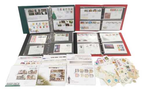 Four first day cover albums, various dates, together with loose examples.