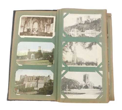 An early 20thC postcard album, containing topographical scenes depicting church and cathedral...