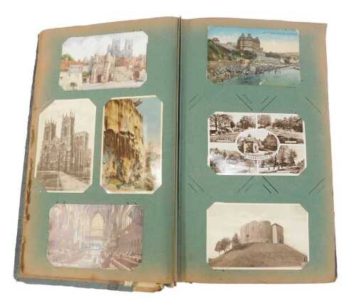 An early 20thC and later postcard album, containing topographical scenes including Bournemouth,...