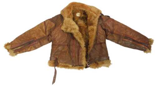 A WWII period brown leather and sheepskin flying jacket, size 4, bearing a label, with a buckle...
