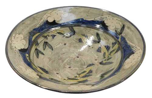 A Nick Chapman studio pottery bowl, decorated centrally with fish, squid, etc., within a band of...