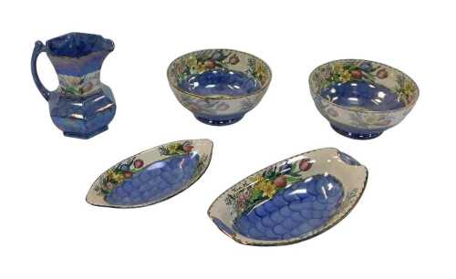 A group of Maling Springtime pattern purple lustre ware, comprising two footed bowls, 22cm wide,...