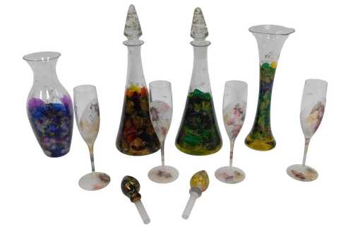A group of Irimiea glassware, to include a baluster vase, with mottled purple and blue...