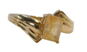 A 9ct gold QVC dress ring, with square cut citrine, on cross over shoulders, bearing import...