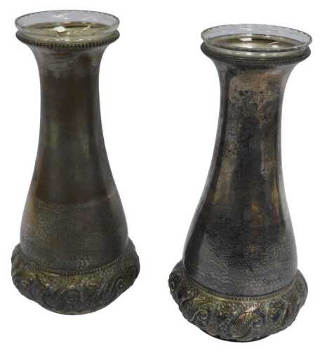 A pair of WMF silver plated vases, each of cylindrical outswept form, with beaded border and...