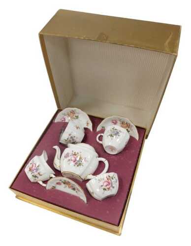 A Royal Crown Derby porcelain Derby Posies pattern tea set, comprising teapot, two teacups and...