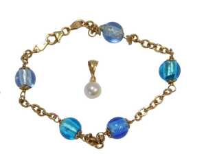 A 9ct gold bracelet, set with five vari-coloured blue beads at intervals, with a lobster claw...