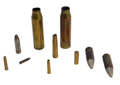 Various spent artillery shells, to include rifle cartridge cases, two World War II cartridge...