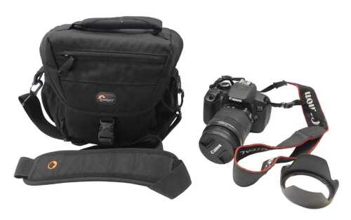A Canon EOS 650D DSLR camera, DS126371, with a Canon Zoom 18-135mm lens and strap, contained in...