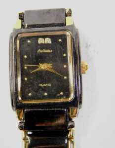 Two lady's fashion watches, comprising a Lee Cordon 18ct gold plated blackened effect wristwatch,... - 2