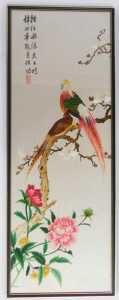 Oriental School. Four silkwork pictures depicting birds among flowering branches, 96cm x 33cm,... - 2