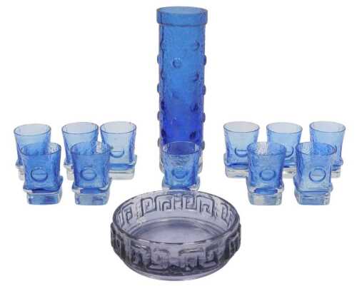 A Helena Tynell for Riihimaen Lasi cylindrical blue-tinted glass vase, with raised roundel...