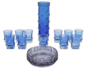 A Helena Tynell for Riihimaen Lasi cylindrical blue-tinted glass vase, with raised roundel...