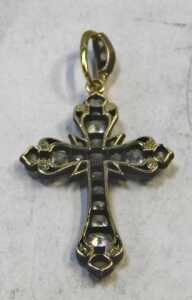 A diamond crucifix pendant, set with varying sized old mine cut diamonds, the largest end four... - 2