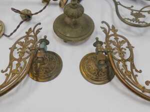 A group of brass and other oil lamp brackets, to include a brass example with a spirally turned... - 4