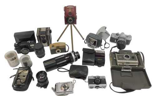 A group of cameras and optical-related items, to include a Coronet Twelve-20 camera, a Polaroid...