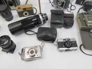 A group of cameras and optical-related items, to include a Coronet Twelve-20 camera, a Polaroid... - 3