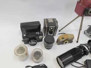 A group of cameras and optical-related items, to include a Coronet Twelve-20 camera, a Polaroid... - 4