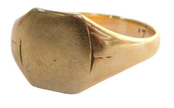 A George V 9ct gold signet ring, with a plain polished shield, maker JH, Birmingham 1917, size X,...