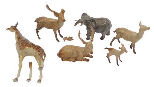 A group of Beswick pottery animals, comprising giraffe, elephant, two stag, a deer, and a foal....