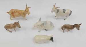 A group of Beswick pottery animals, comprising two goats, two donkeys, a sheep, and a pig. (AF) - 2