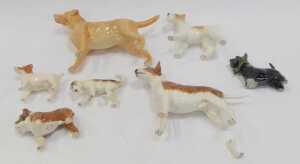 A group of Beswick pottery dogs, to include black glazed West Highland terriers, 7cm high,... - 2