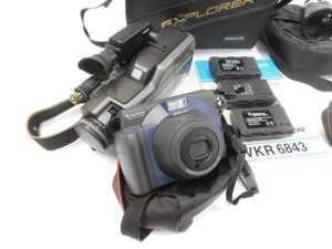 A group of cameras, to include Canon EOS 650 SLR camera, and Olympus OM10, Ricoh TLS 401, etc.... - 4