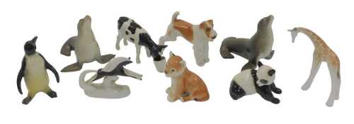 A group of Lomonosov and other pottery animal figures, to include penguin, 14cm high, dogs,...