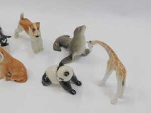 A group of Lomonosov and other pottery animal figures, to include penguin, 14cm high, dogs,... - 2