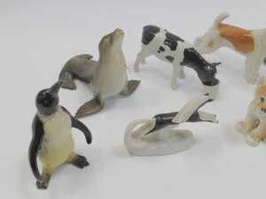 A group of Lomonosov and other pottery animal figures, to include penguin, 14cm high, dogs,... - 3