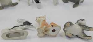 A group of Lomonosov and other pottery animal figures, to include penguin, 14cm high, dogs,... - 4