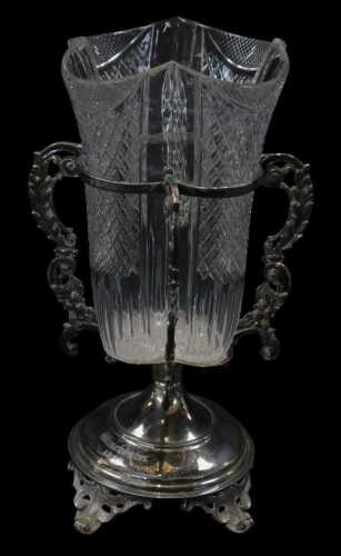 A Victorian silver plated and cut glass vase, the removable cut-glass central section within a...