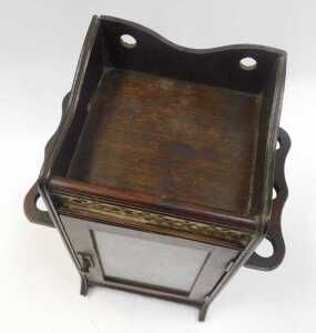 An Edwardian oak smoker's cabinet, the raised top with a pierced brass panel to the front, above... - 2