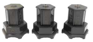 Three Selcol plastic wind-up musical cigarette dispensers, in black, 21cm high.