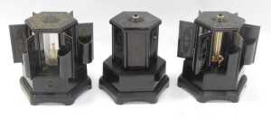Three Selcol plastic wind-up musical cigarette dispensers, in black, 21cm high. - 3
