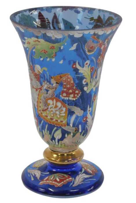 A 20thC Continental blue glass vase, of trumpet form, decorated in coloured enamels depicting...