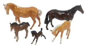 A group of Beswick pottery horses, including Palomino, and brown bay, the largest 17cm high. (5,...