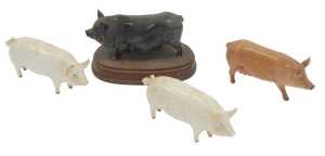 Two Beswick pottery Champion Wall Boy pigs, 7cm high, together with a Royal Doulton Tamworth pig,...