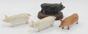 Two Beswick pottery Champion Wall Boy pigs, 7cm high, together with a Royal Doulton Tamworth pig,... - 2