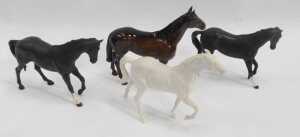 A Beswick pottery horse modelled as The Winner 2421, 24cm high, together with two matte... - 2